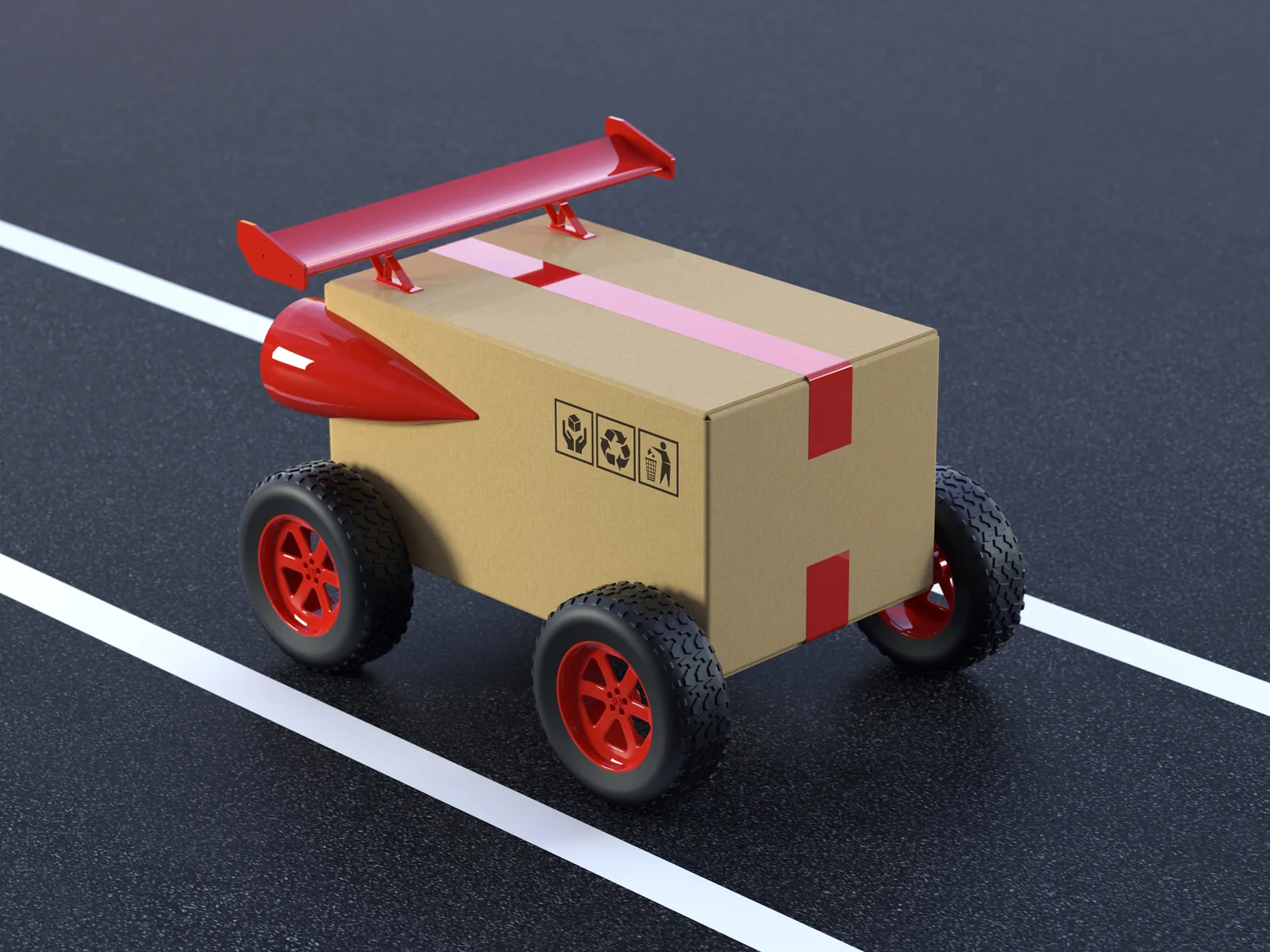 A cardboard parcel on racing wheels with a rear spoiler, speeding down a road