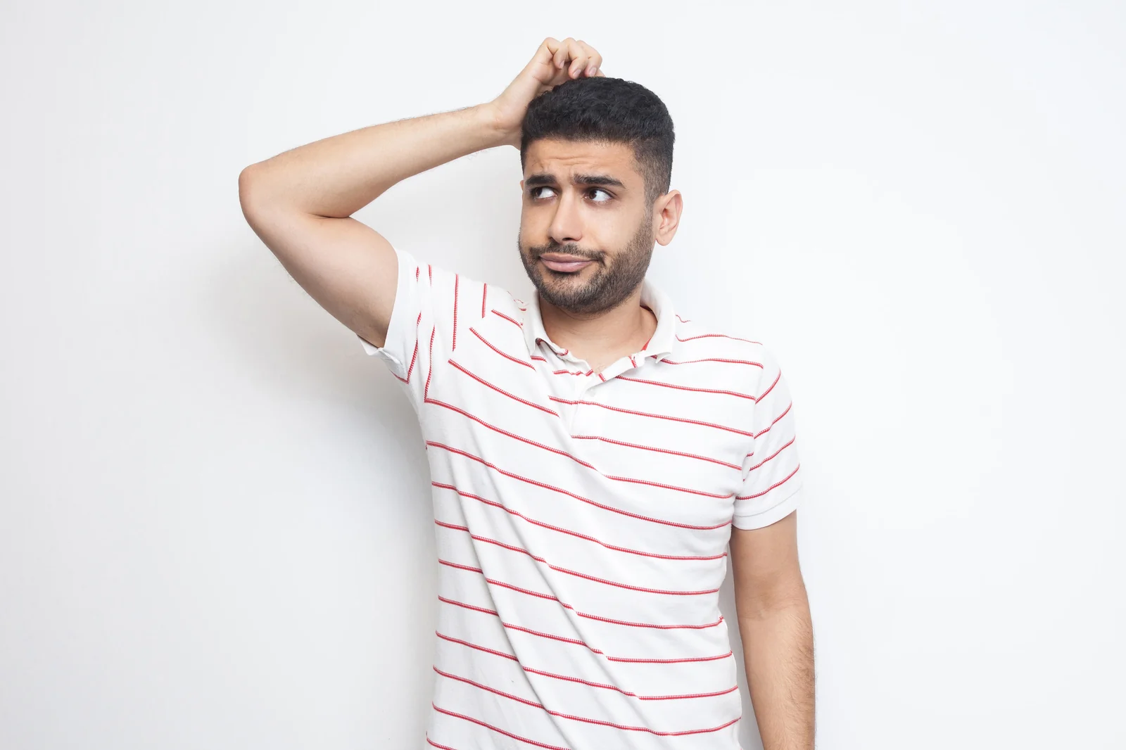 A man pausing, unsure