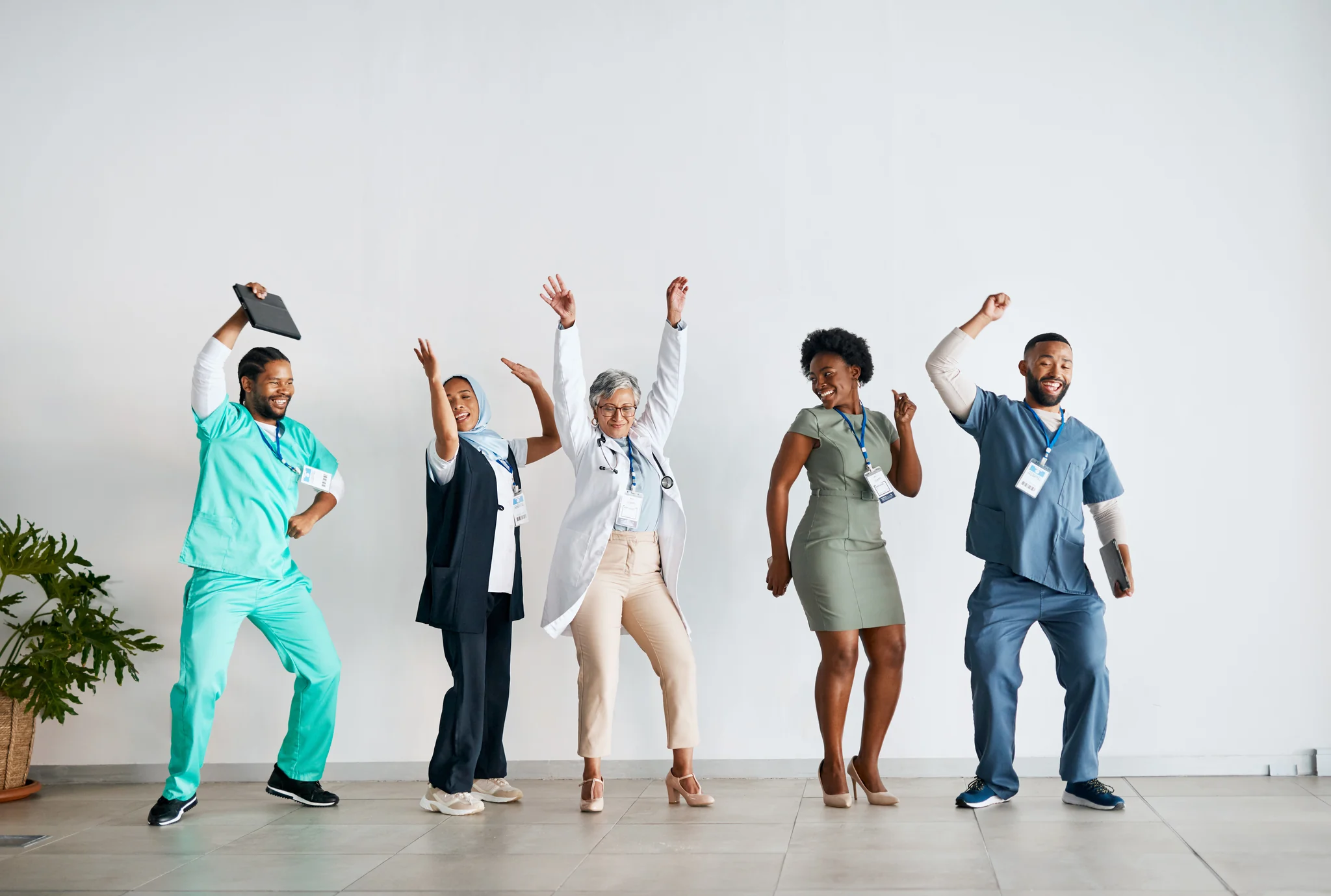 A team of clinical staff celebrating together