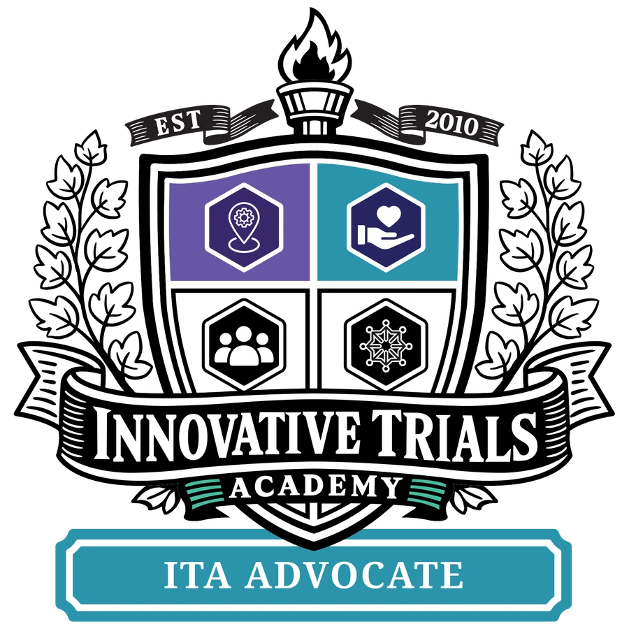 The ITA Advocate crest, with a teal name plate